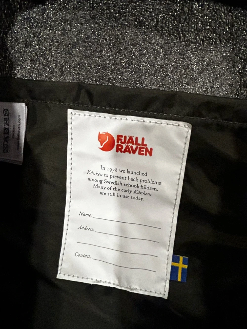 Fjallraven Kanken Backpack in Dark Green with Red Logo